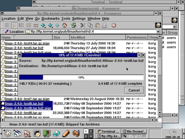 Using the Konqueror file manager from KDE2 to download the latest Linux kernel.